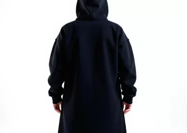 a woman in a black hoodie